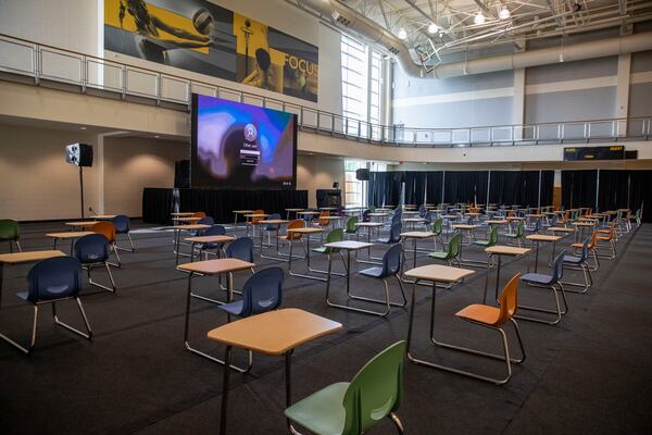 A large classroom is set up in a recreation gym at the Dr. Betty L. Siegel Student Recreation and Activities Center during the first day of classes at Kennesaw State University's main campus in Kennesaw, Monday, Aug. 17, 2020. (Alyssa Pointer / Alyssa.Pointer@ajc.com)