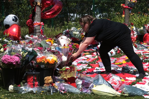 Football fans leave tributes in memory of Liverpool player Diogo Jota at Anfield Stadium, home of FC Liverpool in Liverpool, Thursday, July 3, 2025.(AP Photo/Ian Hodgson)