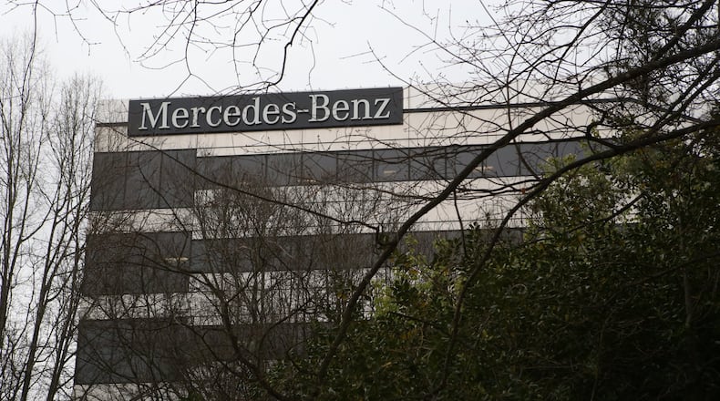 The logo at the top of the Mercedes-Benz USA corporate office building peaks through the branches of surrounding trees in Atlanta on March 13. Mercedes-Benz is one of the many large companies that benefits from multi-million-dollar tax breaks awarded by quasi-governmental agencies. Development authorities in development authorities in Cobb, DeKalb, Fulton and Gwinnett counties and the city of Atlanta have awarded about $500 million in tax incentives over the last three years, according to an analysis by The Atlanta Journal-Constitution. (HENRY TAYLOR / HENRY.TAYLOR@AJC.COM)