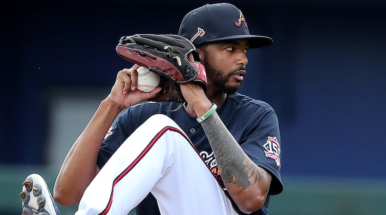 Braves reliever Carl Edwards Jr. delivers during live batting practice at spring training Feb. 24, 2021, at CoolToday Park in North Port, Fla. (Curtis Compton / Curtis.Compton@ajc.com)