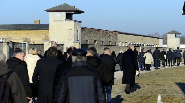 Visitors at the Sachsenhausen concentration camp memorial in Germany, on the Holocaust Remembrance Day, 2017. (Maurizio Gambarini/via AP)