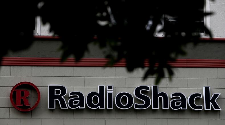 SAN FRANCISCO, CA - MARCH 04: A sign hangs on the exterior of a Radio Shack store on March 4, 2014 in San Francisco, California. RadioShack announced plans to close over 1,000 of its underperforming stores, approximately 20 percent of its retail locations, as part of a restructuring to be more competitive in retail electronics. (Photo by Justin Sullivan/Getty Images)