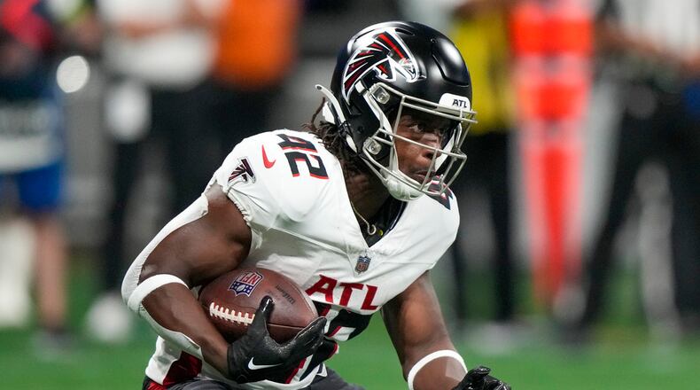 Atlanta Falcons running back Godwin Igwebuike runs against the Pittsburgh Steelers during the first half of a preseason NFL football game Thursday, Aug. 24, 2023, in Atlanta. (AP Photo/Gerald Herbert)