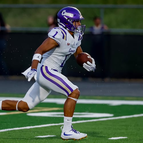 Cartersville's Madoxx Davis returns the opening kickoff against Hiram in an Aug. 21, 2026, game. Madoxx, a 5-star football recruit, was a finalist in the Clas 4A 100 meters as a sophomore last season with his 10.75-second time in the final. (Erik S. Lesser for the AJC)