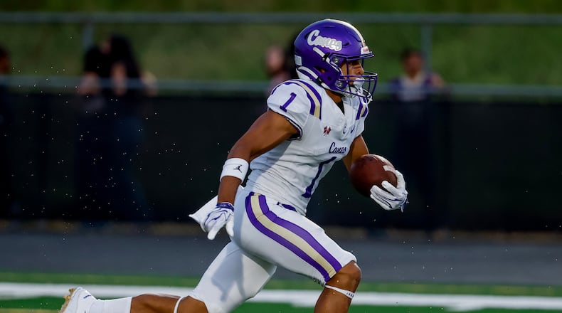 Cartersville's Madoxx Davis returns the opening kickoff against Hiram in an Aug. 21, 2026, game. Madoxx, a 5-star football recruit, was a finalist in the Clas 4A 100 meters as a sophomore last season with his 10.75-second time in the final. (Erik S. Lesser for the AJC)