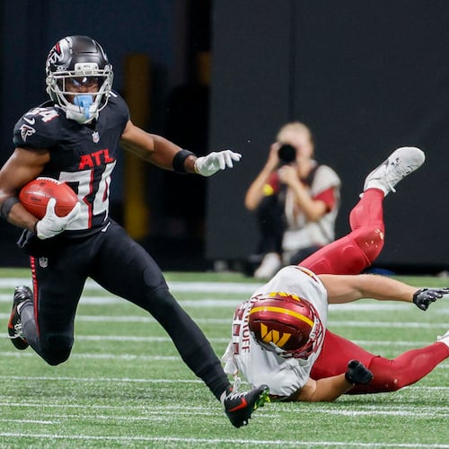 Falcons wide receiver Ray-Ray McCloud breaks a tackle during the second half of a game against the Washington Commanders at Mercedes-Benz Stadium in Atlanta on Sunday, Sept. 28, 2025. (Miguel Martinez/AJC)