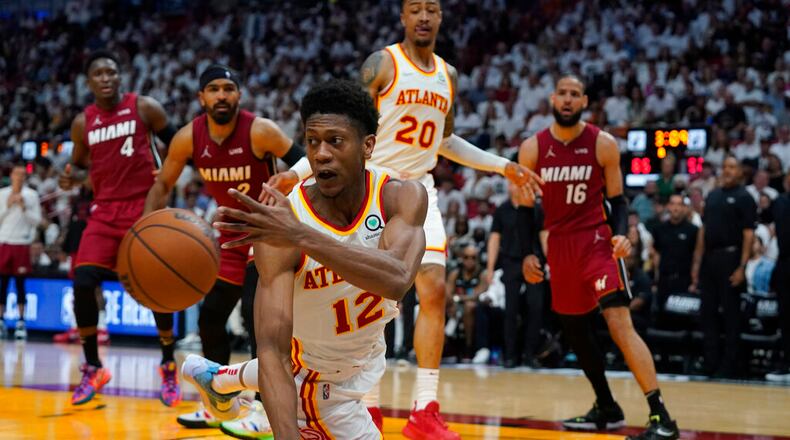 Hawks forward De'Andre Hunter and his teammates are eager to return to the court. (AP Photo/Wilfredo Lee)