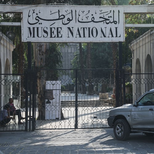 The gate of the entrance of the National Museum of Syria is closed, in Damascus, Wednesday, Nov. 12, 2025. ( (AP Photo/Ghaith Alsayed)