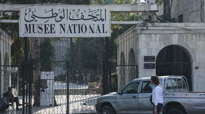 The gate of the entrance of the National Museum of Syria is closed, in Damascus, Wednesday, Nov. 12, 2025. ( (AP Photo/Ghaith Alsayed)