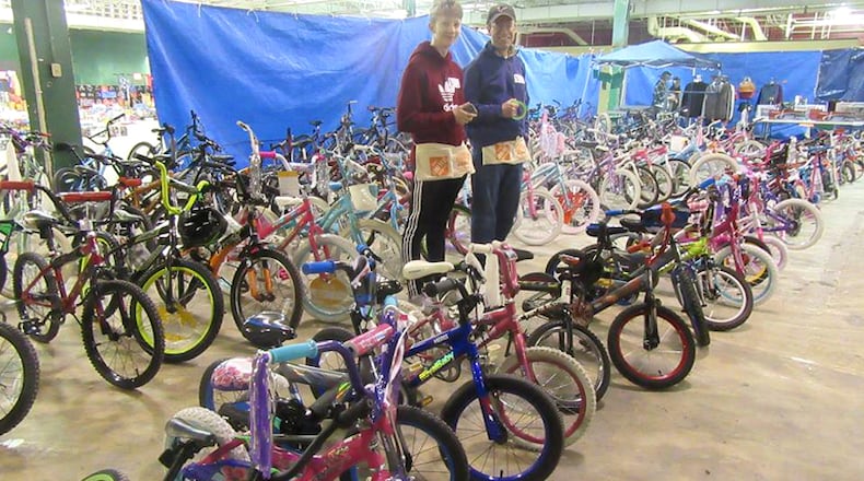 Children’s bicycles are among the gifts available to needy families at North Fulton Community Charities’ Santa Shop. NFCC recently received permission from Alpharetta to use a former furniture store as its base of operations for its Holiday Assistance Program. NORTH FULTON COMMUNITY CHARITIES via Facebook