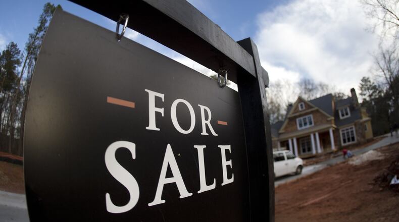 A home under construction and for sale is shown in Roswell. (AP Photo/John Bazemore, File)
