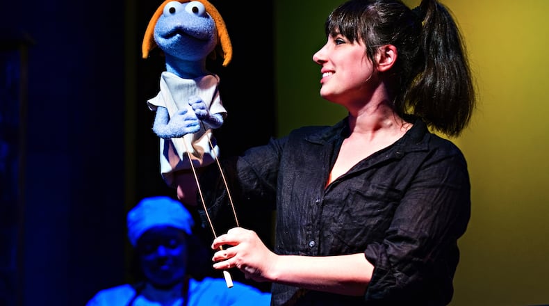 Phoebe Bottoms in "Felt Street," a Dad's Garage improv show where puppets and humans collide in a quirky neighborhood.