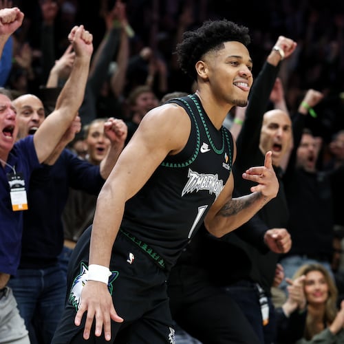 Minnesota Timberwolves guard Terrence Shannon Jr. (1) celebrates his three-point basket against the Denver Nuggets during the second half of Game 6 of a first-round NBA basketball playoffs series, Thursday, April 30, 2026, in Minneapolis. (AP Photo/Matt Krohn)
