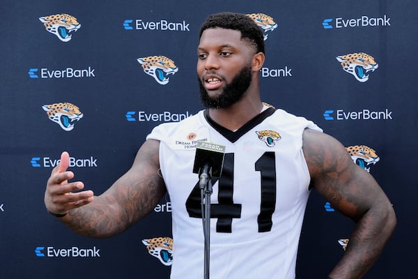 Jacksonville Jaguars defensive end Josh Hines-Allen answers questions during a news conference after a team NFL football practice, Monday, June 2, 2025, in Jacksonville, Fla. (AP Photo/John Raoux)