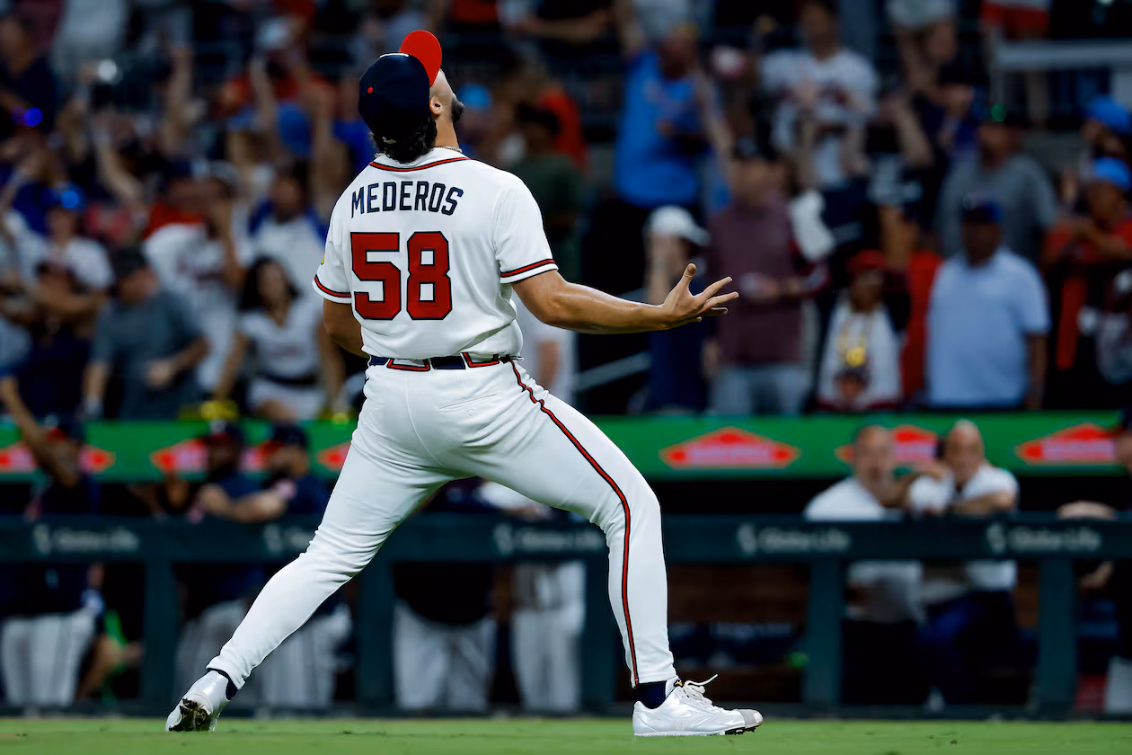 Atlanta Braves pitcher Victor Mederos reacts after defeating the San Diego Padres during the ninth inning of a baseball game, Monday, July 20, 2026, in Atlanta. (AP Photo/Erik S. Lesser)