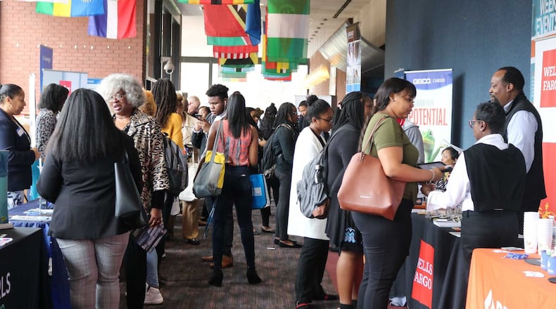 Spelman College students talk to recruiters during a career fair shortly before the coronavirus pandemic. The college will not have in person instruction this fall semester because of the recent rise in confirmed COVID-19 cases and deaths in many parts of the country. CONTRIBUTED