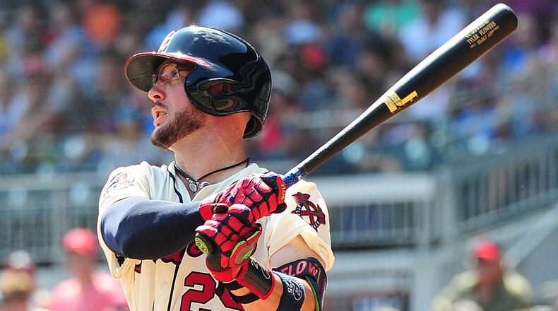Tyler Flowers #25 of the Atlanta Braves hits a fifth inning grand slam against the Cincinnati Reds at SunTrust Park on August 20, 2017 in Atlanta, Georgia. (Photo by Scott Cunningham/Getty Images)