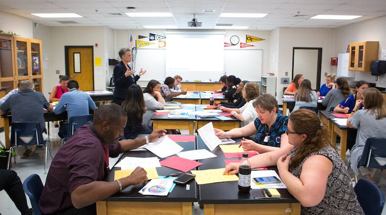 Gwinnett County Public Schools’ newest educators are shown at a teacher orientation at Peachtree Ridge High School in Suwanee, Ga., on Wednesday, July 17, 2019. (Casey Sykes for The Atlanta Journal-Constitution)
