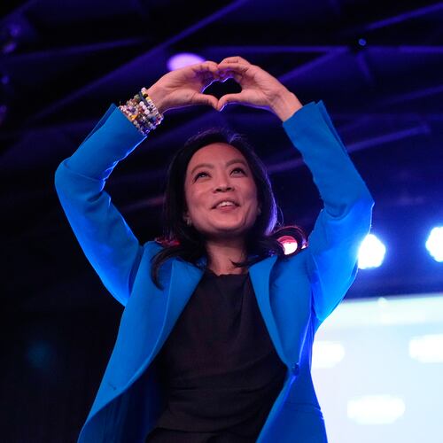 Democratic gubernatorial candidate Francesca Hong makes a heart gesture to supporters after speaking during a primary election night watch party Tuesday, Aug. 11, 2026, in Madison, Wis. (AP Photo/Nam Y. Huh)
