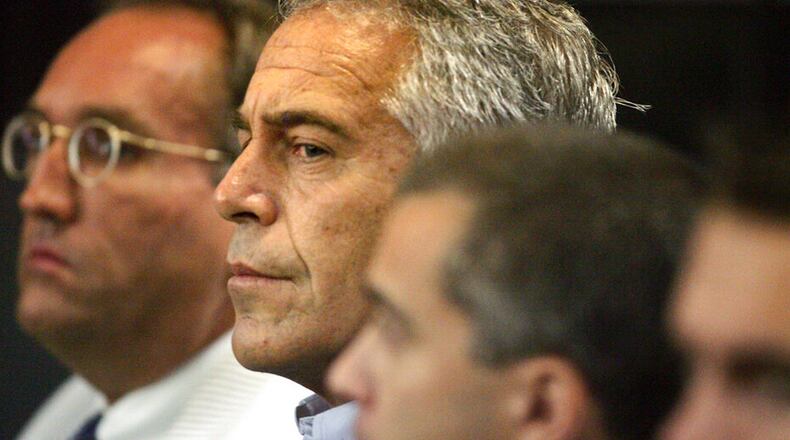In this July 30, 2008 file photo, Jeffrey Epstein is shown in custody in West Palm Beach, Fla. Epstein was arrested Saturday on federal sex trafficking charges, according to law enforcement authorities.