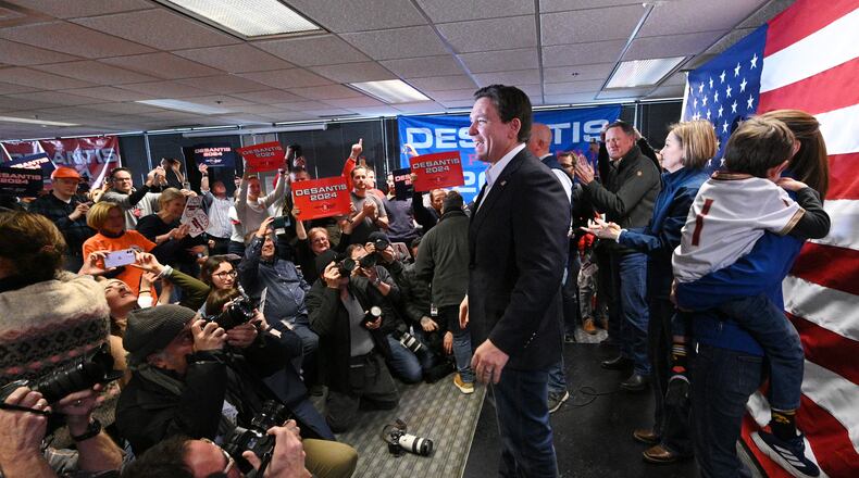 Republican presidential candidate Florida Gov. Ron DeSantis reacts as he takes on the stage during a campaign event, Saturday, January 13, 2024, in West Des Moines, Iowa. (Hyosub Shin / Hyosub.Shin@ajc.com)