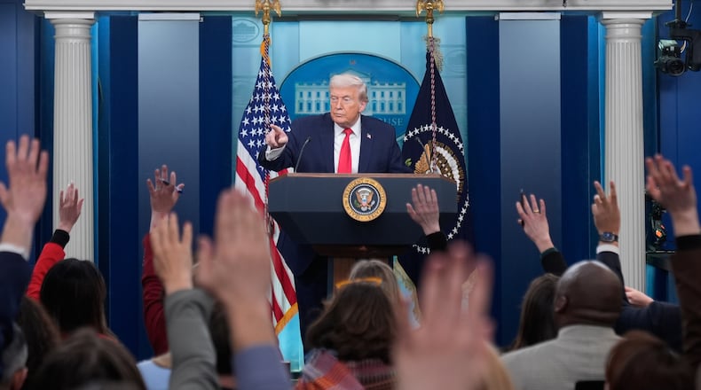 President Donald Trump speaks during a press briefing at the White House in Washington, Tuesday, Jan. 20, 2026. (AP Photo/Mark Schiefelbein)