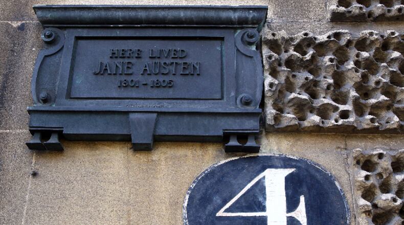 A plaque is displayed on a house that was occupied by Jane Austen when she lived in Bath, England.