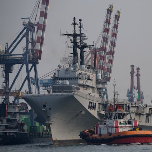 The Giuseppe Garibaldi, a former Italian Navy aircraft carrier, arrives at Tanjung Priok port in Jakarta, Indonesia, Friday, Sept. 18, 2026. (AP Photo/Tatan Syuflana)