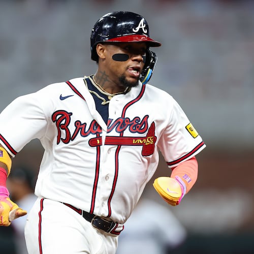 Atlanta Braves' Ronald Acuña Jr. runs to third base in the fifth inning of a baseball game against the Miami Marlins, Wednesday, April 15, 2026, in Atlanta. (AP Photo/Colin Hubbard)
