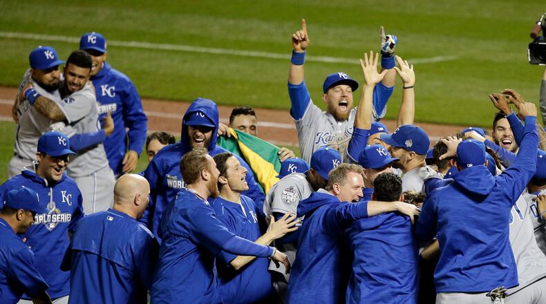 Member of the Kansas City Royals celebrates after Game 5 of the Major League Baseball World Series against the New York Mets Monday, Nov. 2, 2015, in New York. The Royals won 7-2 to win the series. (AP Photo/Julie Jacobson)