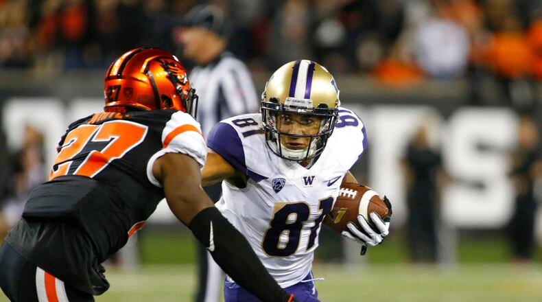 Washington's Brayden Lenius (81) runs after a catch during an NCAA college football game, in Corvallis, Ore., Saturday, Sept. 30, 2017. (AP Photo/Timothy J. Gonzalez)