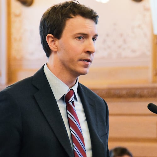 FILE - Bryan Seeley, a Major League Baseball senior vice president, testifies on a bill during a legislative committee hearing, March 13, 2018, at the Statehouse in Topeka, Kan. (AP Photo/Mitchell Willetts, File)