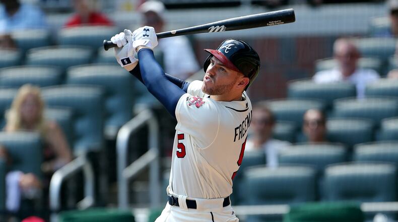 Freddie Freeman, showing during Sunday’s win against Cincinnati, said the strength in his left wrist is only at about 80-85 percent since he returned from a seven-week stint on the disabled list after it was fractured when hit by a pitch May 17. (AP Photo/John Bazemore)