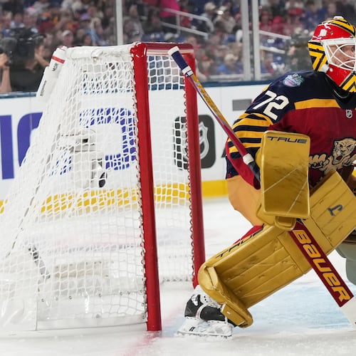 FILE - Florida Panthers goaltender Sergei Bobrovsky defends the goal during the second period of the NHL Winter Classic outdoor hockey game against the New York Rangers Jan. 2, 2026, in Miami. (AP Photo/Lynne Sladky, File)