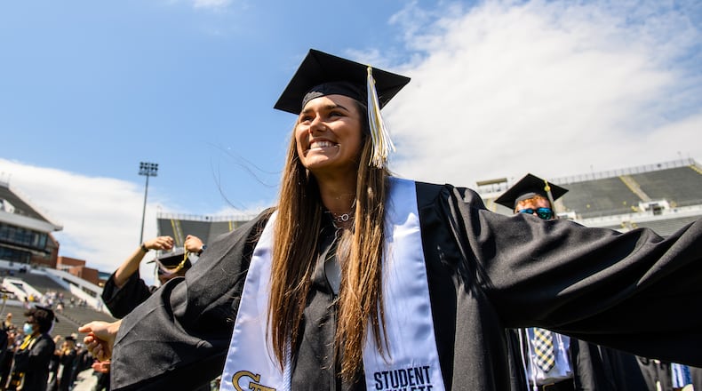 Georgia Tech softball player Cameron Stanford celebrates graduation in May 2021 at Bobby Dodd Stadium. Stanford was a three-time All-ACC outfielder and a two-time member of the All-ACC academic team and earned her degree in mechanical engineering. (Danny Karnik/Georgia Tech Athletics)