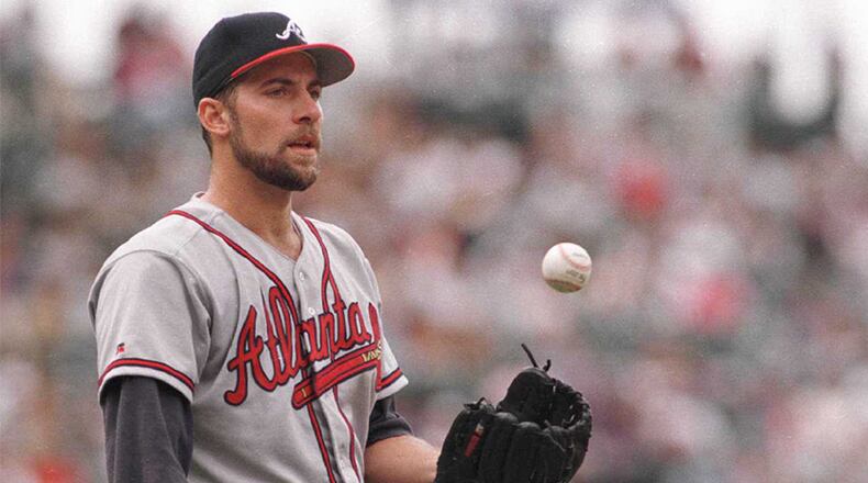 12 Sep 1996: Pitcher John Smoltz of the Atlanta Braves during the Braves versus Rockies game at Coors field in Denver, Colorado. Mandatory Credit: Jed Jacobsohn/Allsport John Smoltz went 15-4 with a 2.67 ERA in the postseason. (Jed Jacobsohn, Allsport)