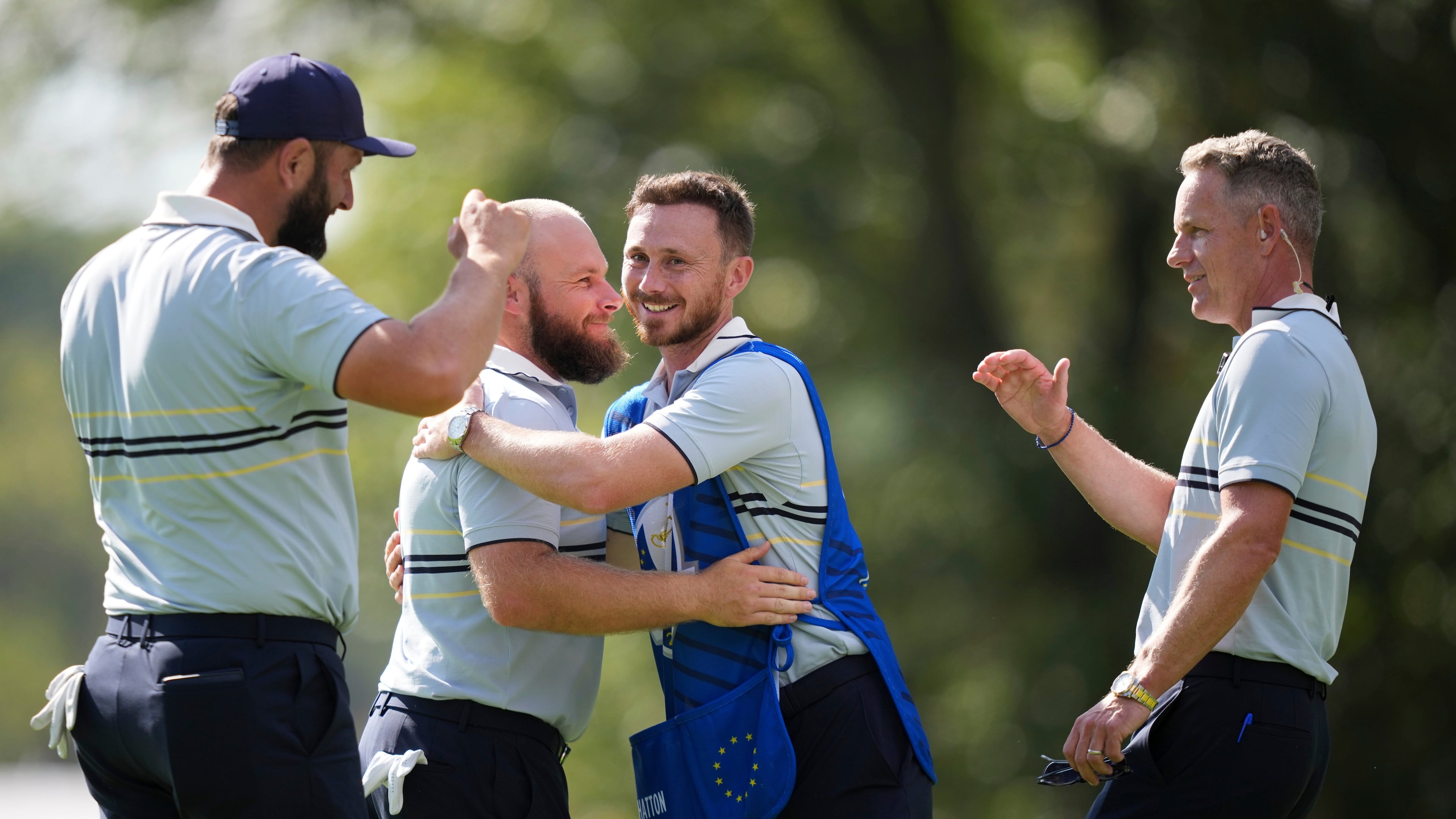Europe's Jon Rahm, Tyrrell Hatton and captain Luke Donald celebrate after their win on the 15th hole at Bethpage Black golf course during the Ryder Cup golf tournament, Friday, Sept. 26, 2025, in Farmingdale, N.Y. (AP Photo/Matt Slocum)
