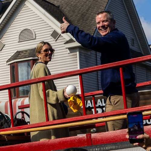 Michigan head coach Dusty May gestures during a parade celebrating their national championship win in the NCAA college basketball tournament , Saturday, April 11, 2026, in Ann Arbor, Mich. ( Devin Anderson-Torrez/Ann Arbor News via AP)