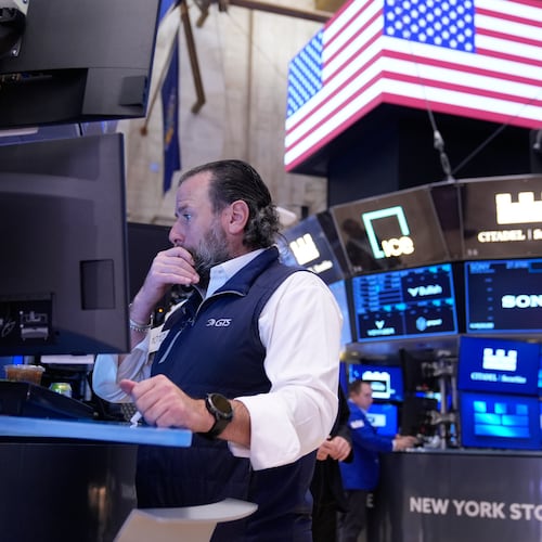 Michael Pistillo works on the floor at the New York Stock Exchange in New York, Tuesday, Nov. 11, 2025. (AP Photo/Seth Wenig)