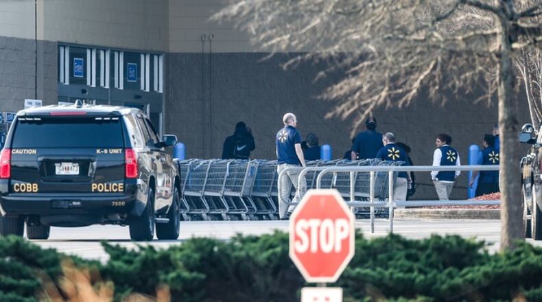 A Wal-Mart in north Cobb County was evacuated Tuesday because of a bomb threat. JOHN SPINK / JSPINK@AJC.COM
