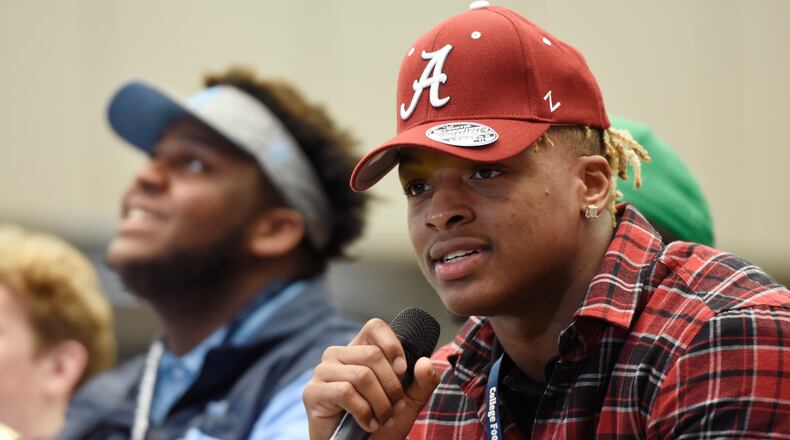 Nine players from north Fulton County will suit up for teams in the College Football Playoff, including Xavier McKinney from Roswell High.