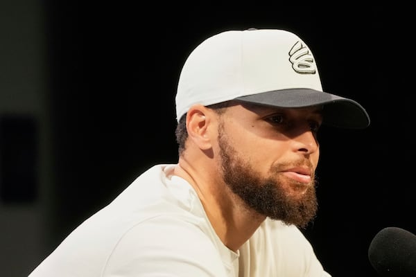 Golden State Warriors guard Stephen Curry speaks during a news conference at the NBA basketball team's basketball facility in San Francisco, Thursday, May 15, 2025. (AP Photo/Jeff Chiu)