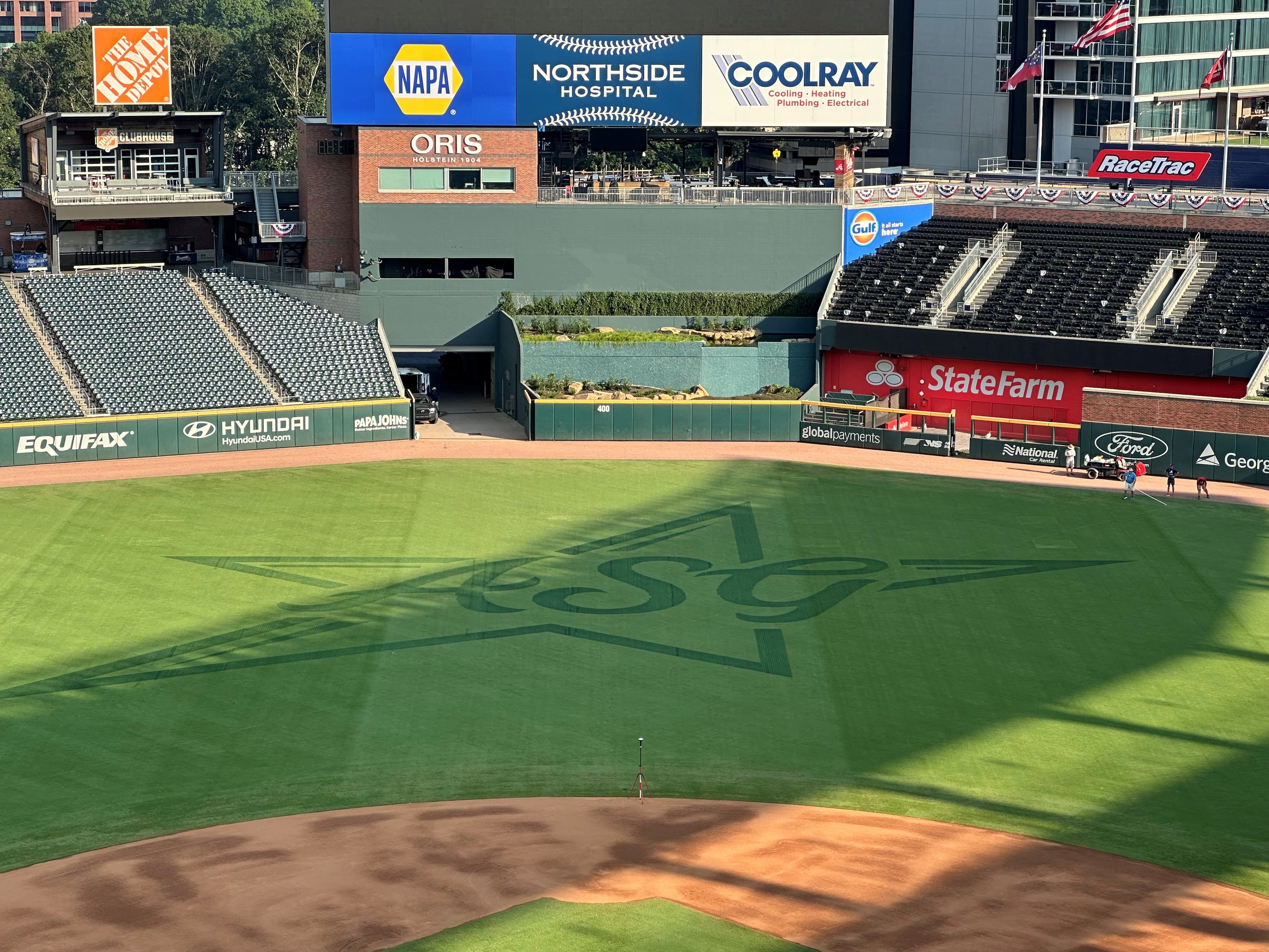 Truist Park's stylized All-Star Game logo, created by Turf Tank robots equipped with green dye.
