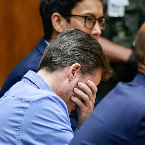 Gerhardt Konig, left, reacts after the verdict is read while sitting with defense attorney Thomas Otake, right, in court Wednesday, April 8, 2026, in Honolulu. (Jamm Aquino/Honolulu Star-Advertiser via AP, Pool)