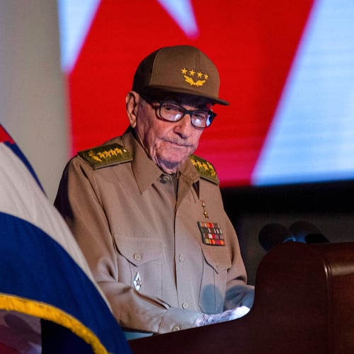 FILE - Former Cuban President Raul Castro looks at the Cuban flag during his speech at the event celebrating the 65th anniversary of the triumph of the revolution in Santiago, Cuba, Jan. 1, 2024. (AP Photo/Ismael Francisco, File)