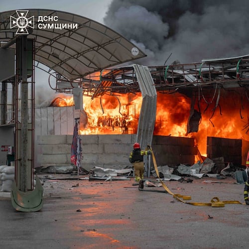 In this photo provided by the Ukrainian Emergency Service, firefighters put out a fire in a gas station following a Russian air attack in Sumy, Ukraine, Thursday, June 25, 2026. (Ukrainian Emergency Service via AP)