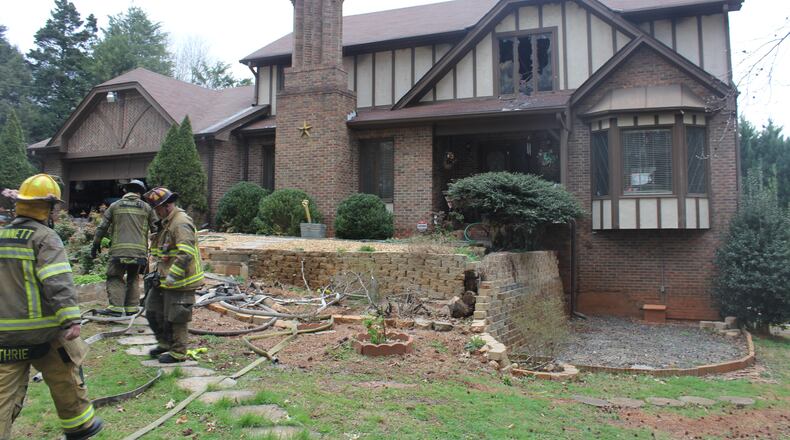 A home in unincorporated Stone Mountain is damaged after a Tuesday morning fire.