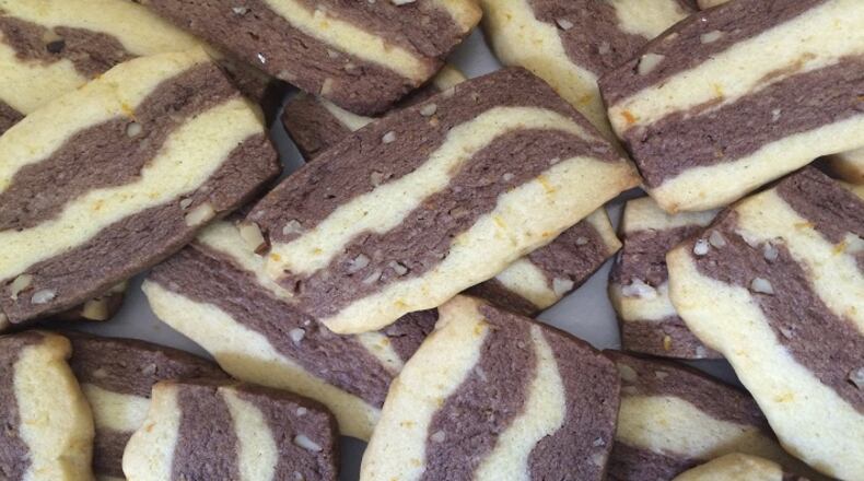 Cardamon, orange and chocolate ribbon cookies are festive and delicious. They go beautifully with a cup of coffee.(Kathy Morrison/Sacramento Bee/TNS)