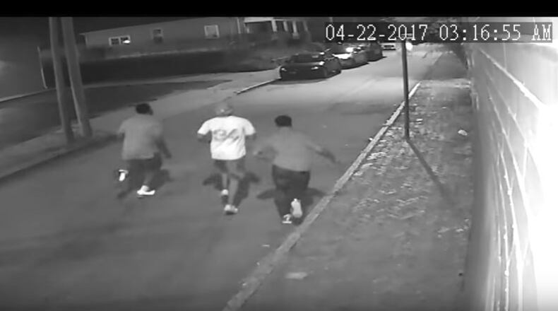 Atlanta police video of suspects running away after an assault Saturday on Edgewood Avenue.