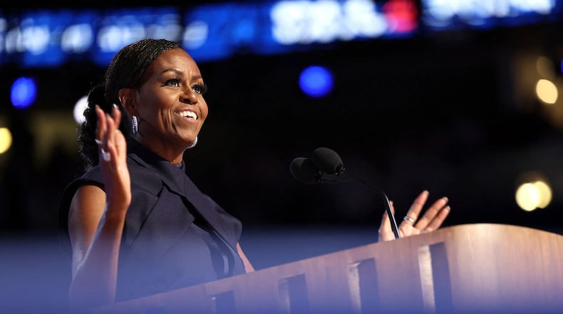 Former First Lady Michelle Obama speaks on the second day of the DNC in Chicago, Illinois. (COURTESY OF CHARLY TRIBALLEAU/AFP/GETTY IMAGES)